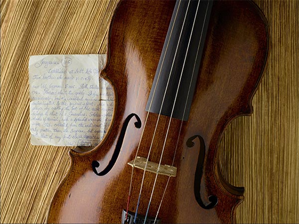 Violin and certificate